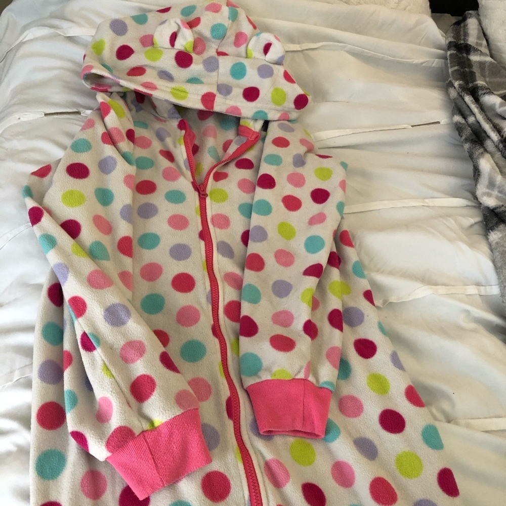 A multicolored Polkadotted onesie